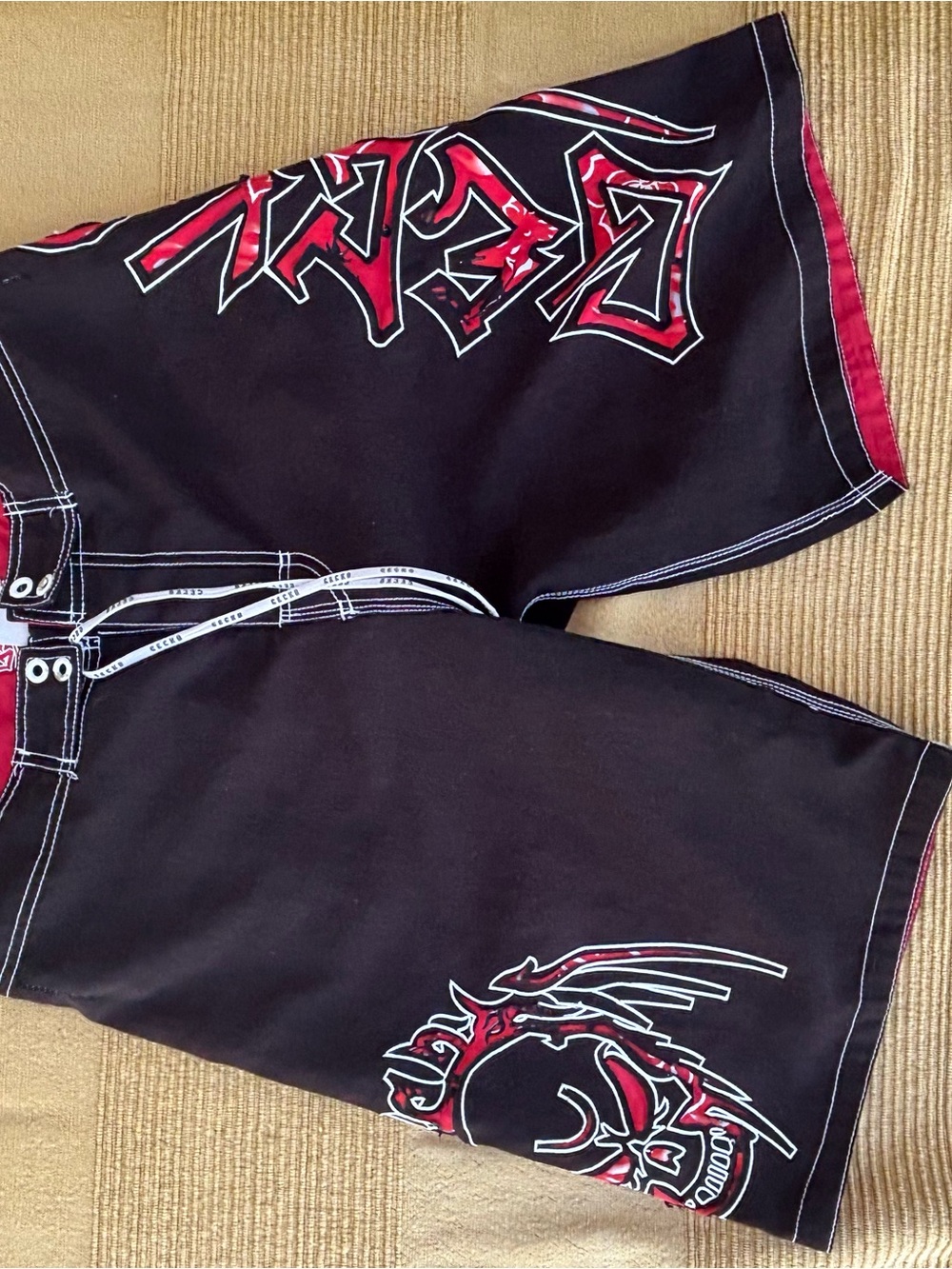Men's Black Swim Shorts with Red Graphic Accents